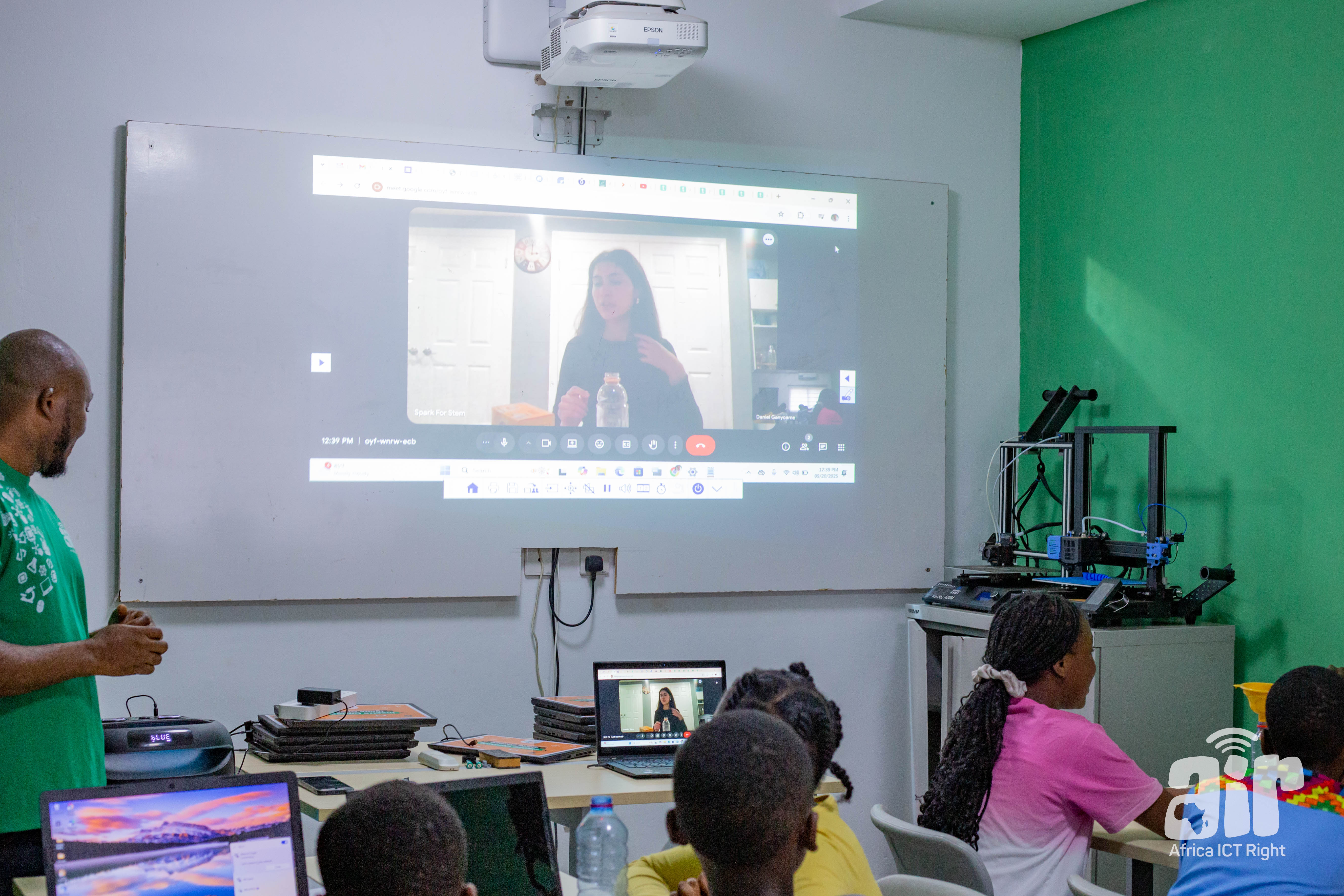 Students watching a virtual presentation from Spark for STEM instructor